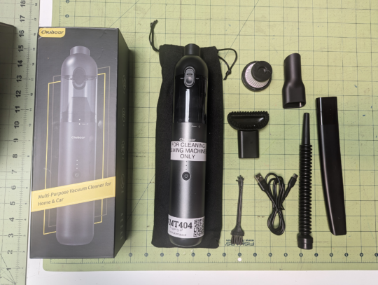 Image of mini handheld vacuum and accessories